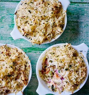 Salmon, bacon and kale pies with celeriac and horseradish rosti topping