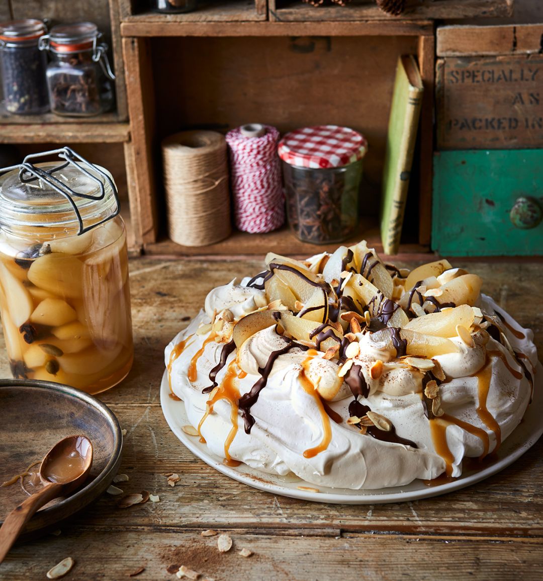 Pavlova with spiced pears and salted caramel sauce