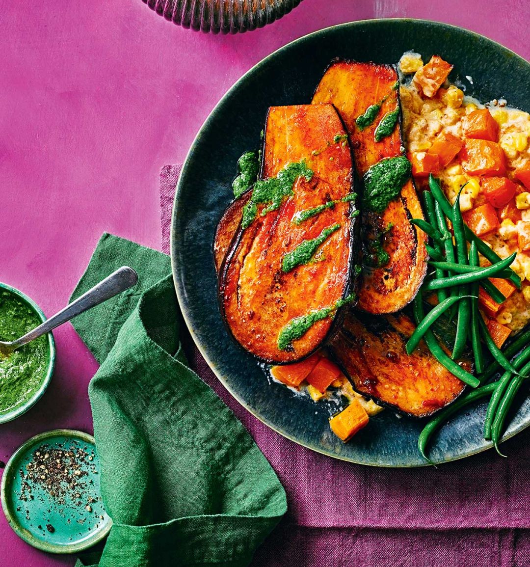 Chipotle aubergine steak with creamed corn and a herby green sauce