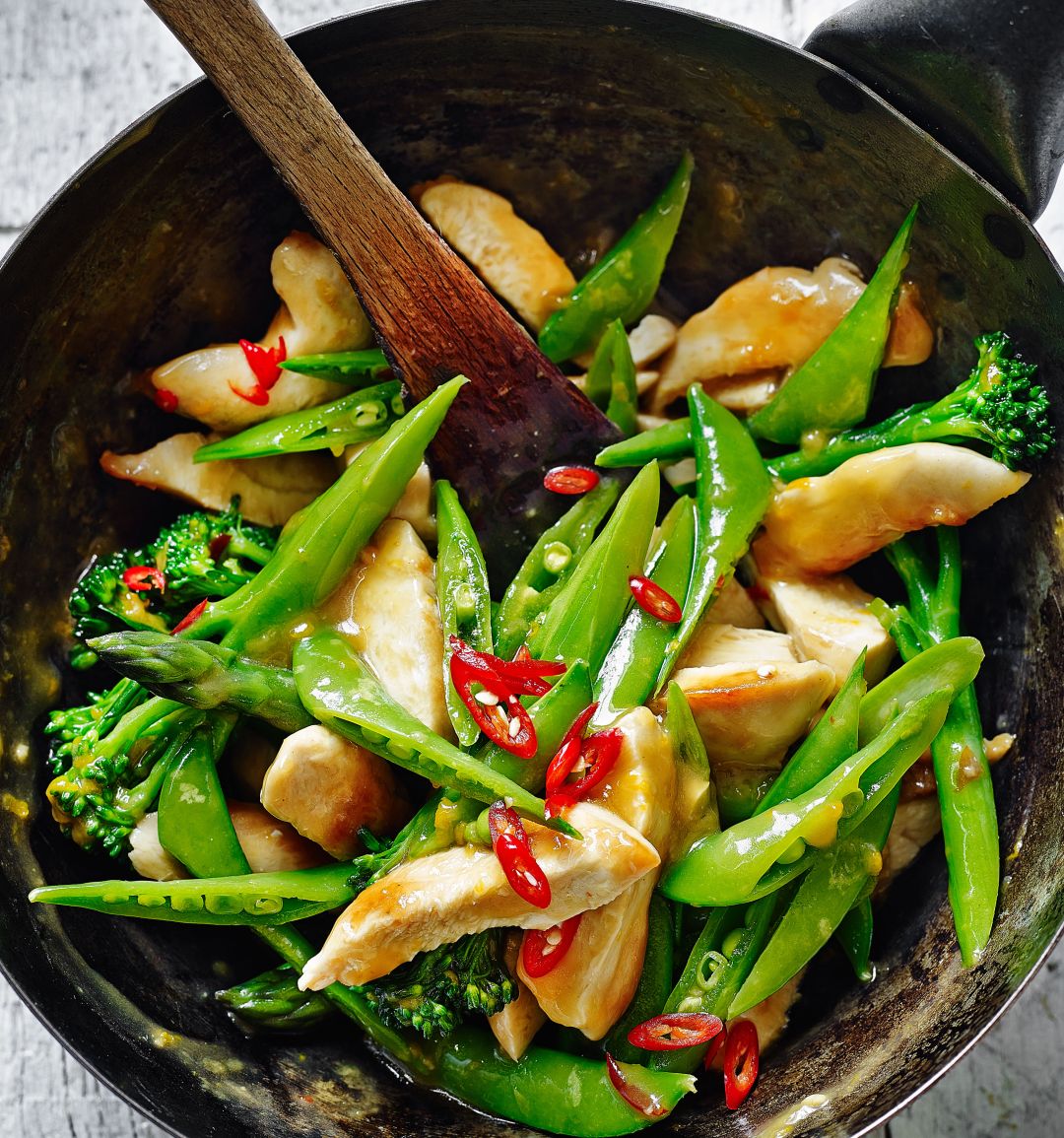 Orange sticky chicken with three green veg