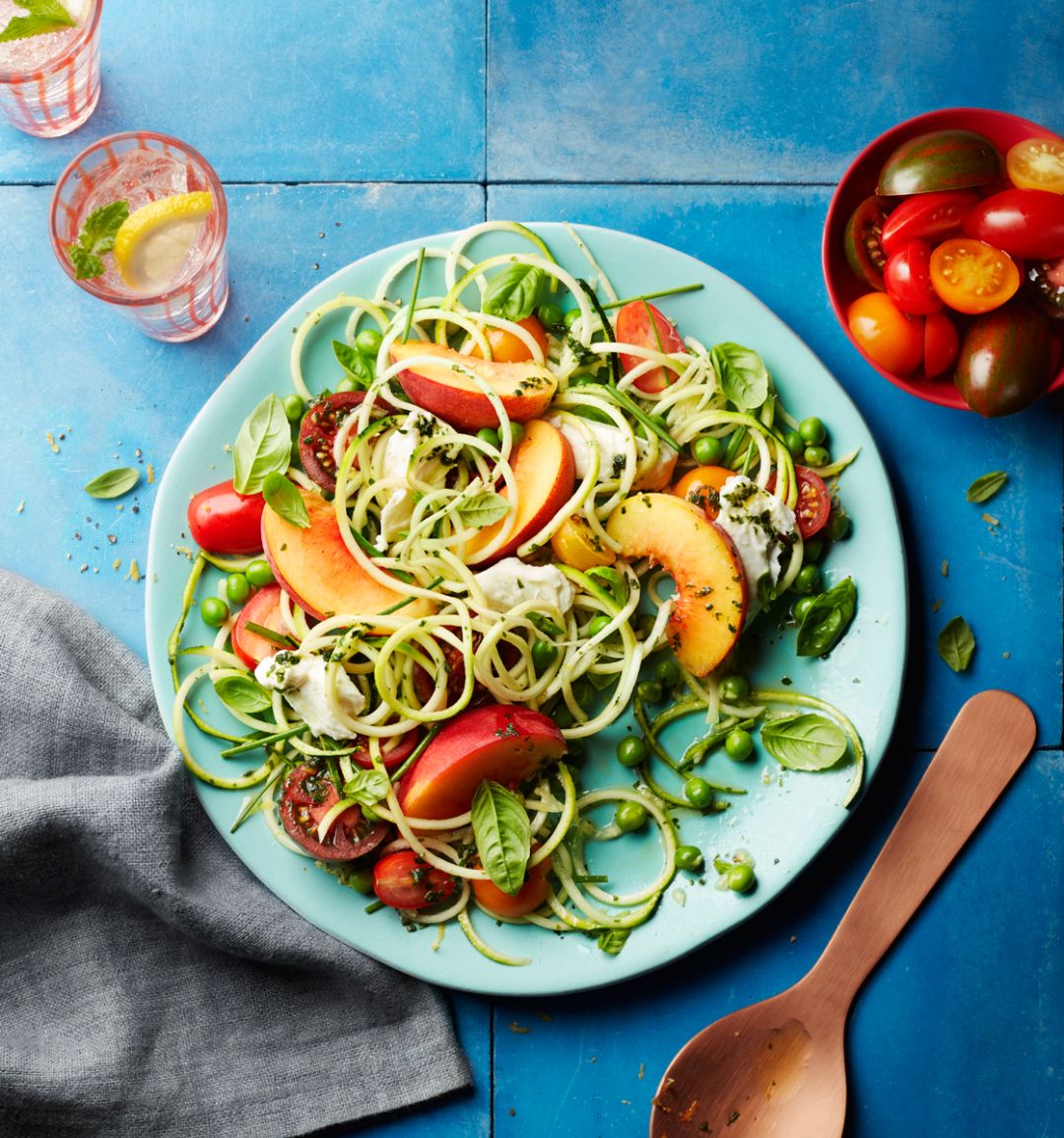 Summer garden salad with peaches and mozzarella