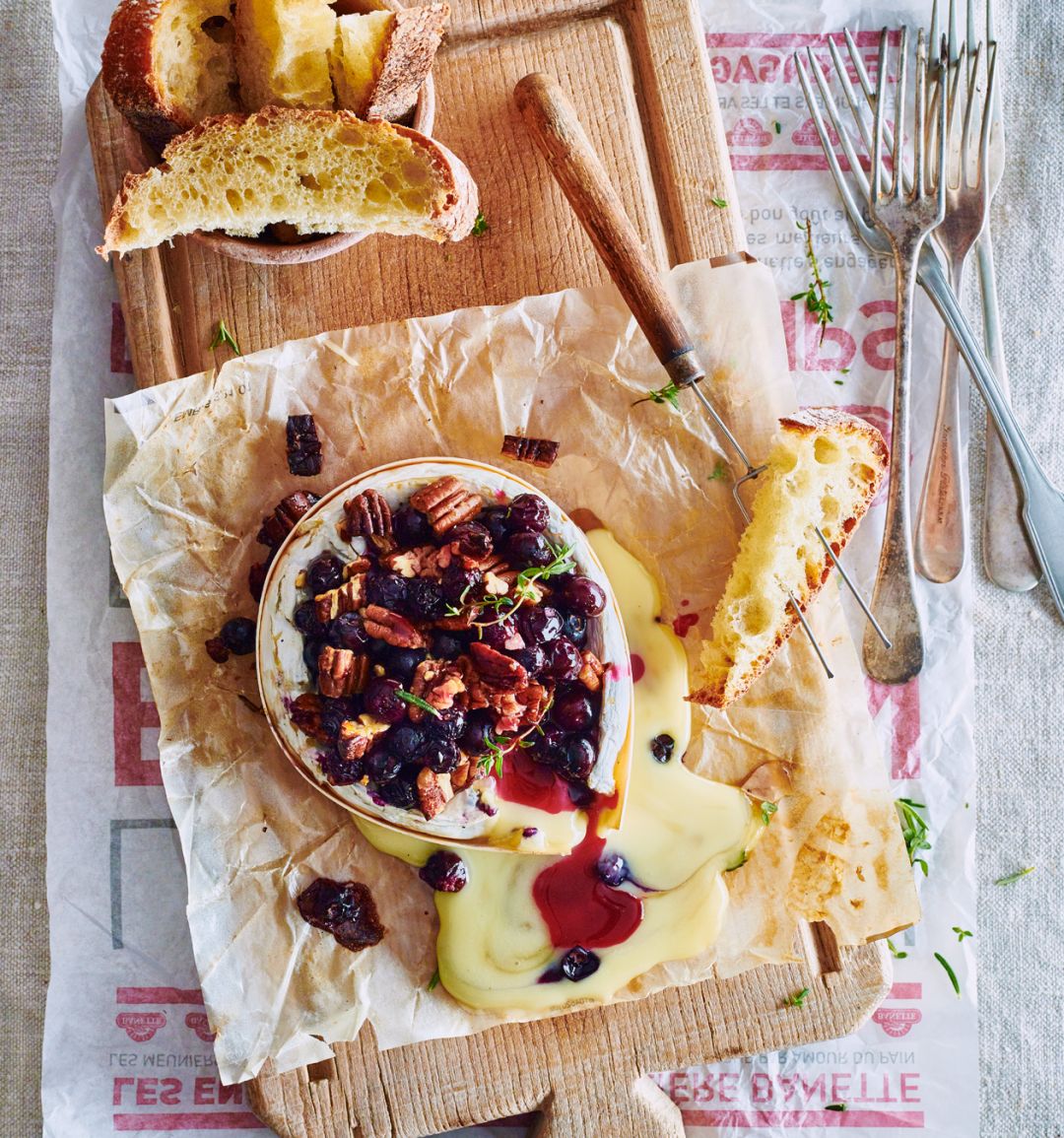 Camembert baked with maple syrup, pecans and blueberries