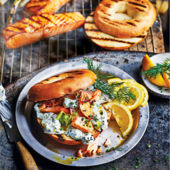 Hot smoked salmon bagels with spring onion and herb soft cheese