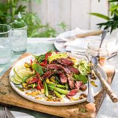 Grilled and raw corn salad with chipotle steak