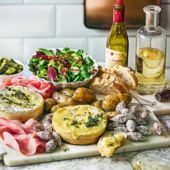 Baked camembert, charcuterie and potatoes