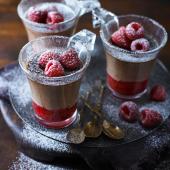 Velvety milk chocolate pots with raspberries
