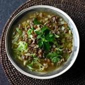 Sausage, lentil and spring greens soup