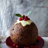 Cranberry gingerbread Christmas pudding with ginger sauce
