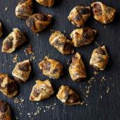 Sausage rolls with mustard and poppy seeds