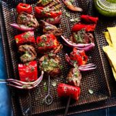 Smoky steak and red pepper kebabs with herby drizzle