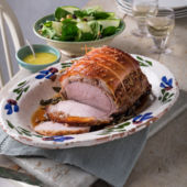 Porchetta-style roast pork with a courgette, chickpea and spinach salad