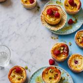 Raspberry and ricotta baked cheesecakes with pistachios and honey