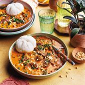 Groundnut beef stew with ground rice balls 
