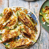 Charred cabbage with spicy brown butter, pine nuts and feta