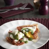 Poached eggs with crispy Parma ham and pesto