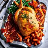 Creamy garlic roast chicken with crispy ham and veggies