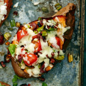 Baked sweet potato with chorizo and melting cheese