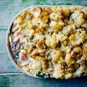 Florentine fish pie with smashed potato and chives