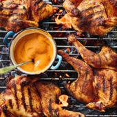 Spiced spatchcock poussins with barbecued peach sauce