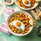 Saffron-braised butter beans with chorizo and fried eggs