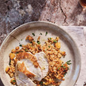 Roast chicken with orange, cumin and apricot rice