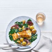 Turmeric salmon with warm saag aloo salad