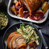Crackling good pork and apple traybake with crunchy pickle slaw