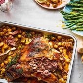 Lamb shoulder, caramelised onions and olives with buttered asparagus