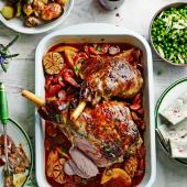 Roast lamb with chorizo, orange and parsley and simple roasties  