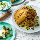 Slow-roast spiced whole celeriac with raita 