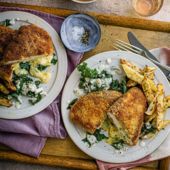 Parma chicken schnitz with cheesy kale and celeriac fries 