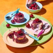Frozen cherry and orange ripple summer puddings