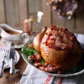 Roast turkey with cranberry stuffing and pigs in blankets