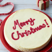 Merry Christmas white chocolate and cranberry cheesecake