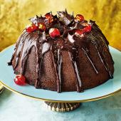 Mulled wine bundt cake with chocolate holly and gilded cherries