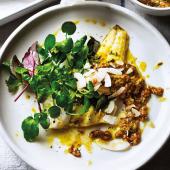 Herb-crusted sea bass with toasted coconut and tomato dressing