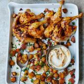 Spiced poussins with roasties