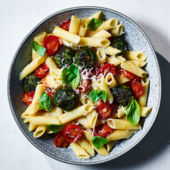Pasta with roasted spinach polpette and tomatoes