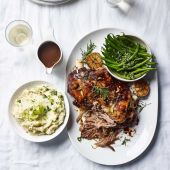 Slow-roasted lamb with spring onion mash and pistou 