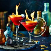 Flaming cranberry & orange cocktail