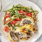 Spinach, cheese and olive stuffed chicken with two-bean salad