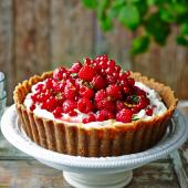 Pile-it-high raspberry and redcurrant cheesecake tart