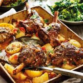 Greek lamb kleftiko with potatoes, oregano and lemon
