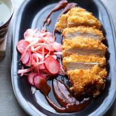 Tonkatsu crumbed pork with radish salad