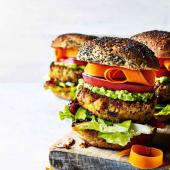 Stacked sweet potato burgers with avocado lime cream