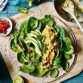 Scrambled egg wrap with Indian spices, avocado and greens