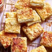 Lemon puff cheesecake slice