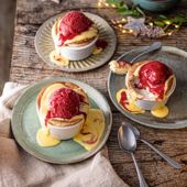 Christmas pudding soufflé with cranberry sorbet and brandy anglaise