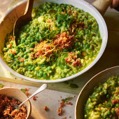 Pea risotto with bacon and hazelnut crumb