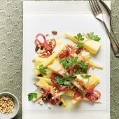 Steamed parsnips with sultanas and pine nuts